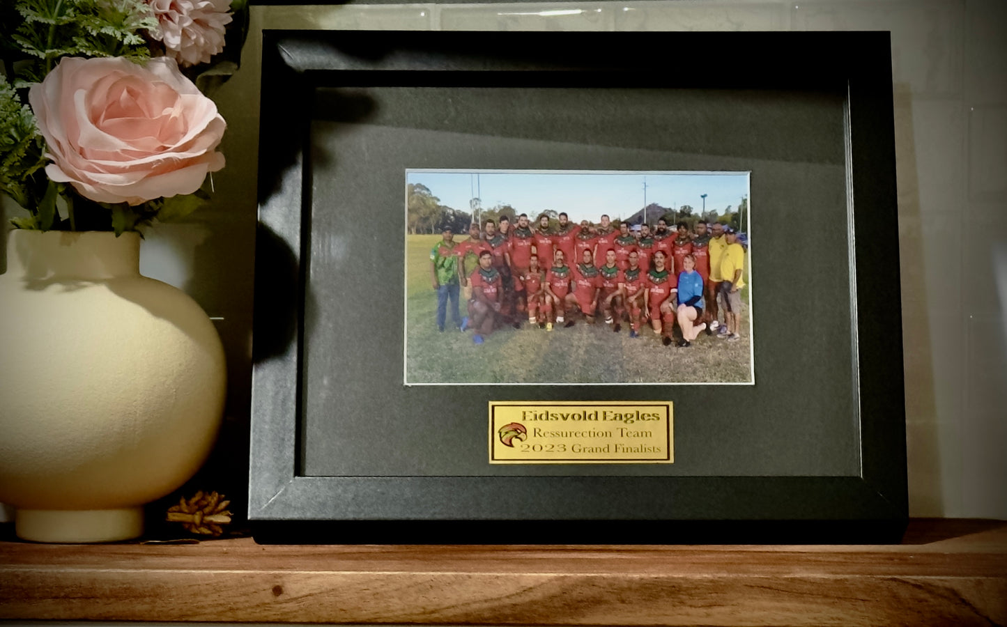 Framed photo and plaque